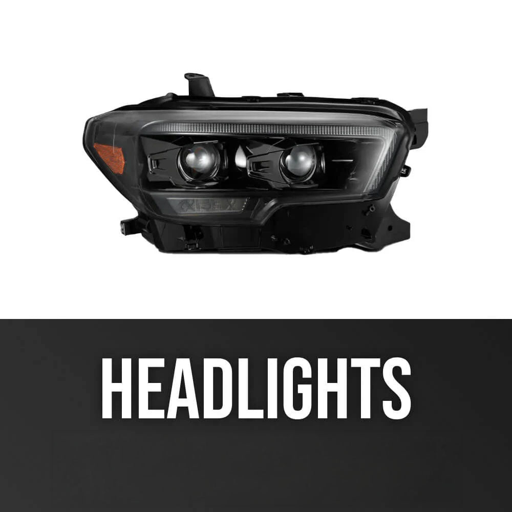 A modern blacked-out headlight assembly with LED projectors and turn signals representing the collection of headlights for Toyota Tacoma at Tacomabeast