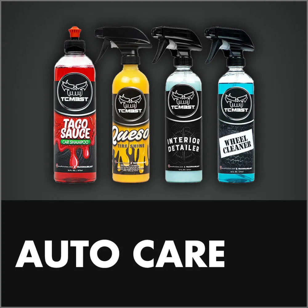 Four Tacomabeast cleaning products for Toyota Tacoma lined up, including red 'Taco Sauce Car Shampoo', yellow 'Queso Tire Shine', teal 'Interior Detailer', and blue 'Wheel Cleaner'