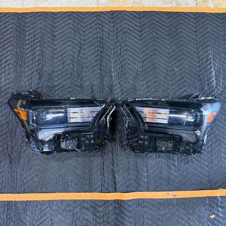 [OPEN BOX] 2024+ Toyota Tacoma OEM Headlights (#81110-AK040 / #81150-AK020)
