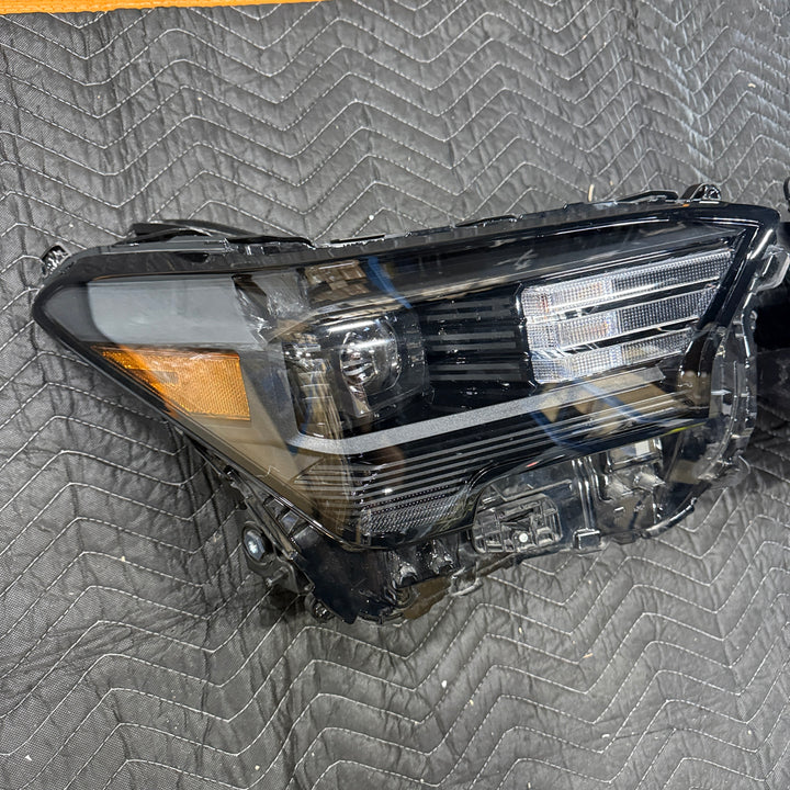 [OPEN BOX] 2024+ Toyota Tacoma OEM Headlights (#81110-AK040 / #81150-AK020)