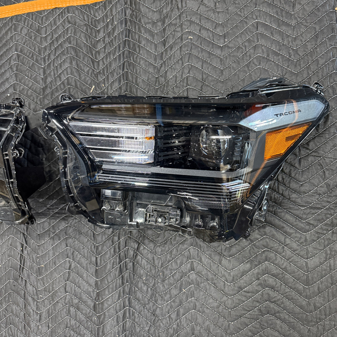 [OPEN BOX] 2024+ Toyota Tacoma OEM Headlights (#81110-AK040 / #81150-AK020)