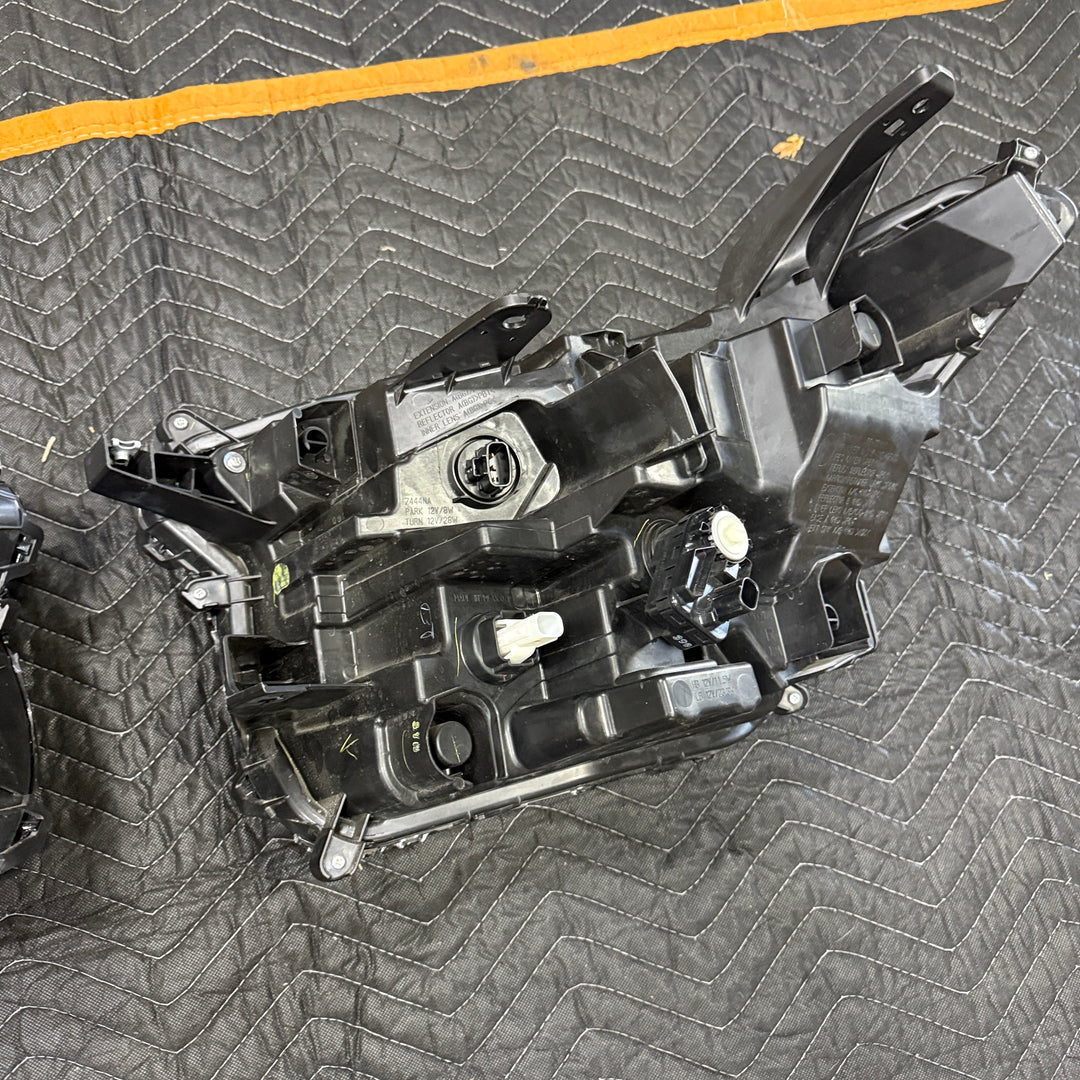 [OPEN BOX] 2024+ Toyota Tacoma OEM Headlights (#81110-AK040 / #81150-AK020)